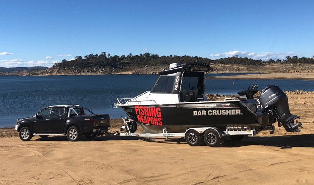 D-MAX tows boat down boat ramp
