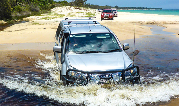 D-MAX drives across beach water crossing