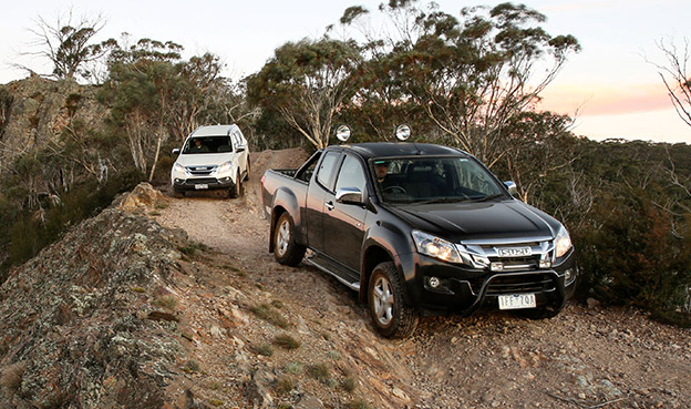 D-MAX and MU-X drive along the ridge of a mountain top 