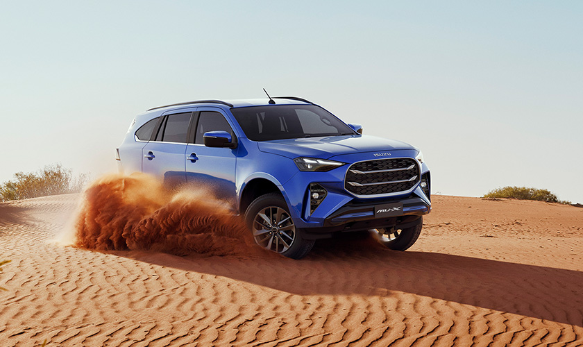 Isuzu MU-X capable driving through off-road terrain