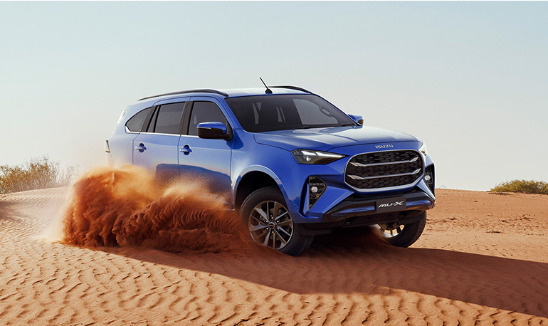 Isuzu MU-X capable driving through off-road terrain